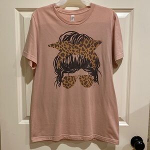 Women’s tee size medium.